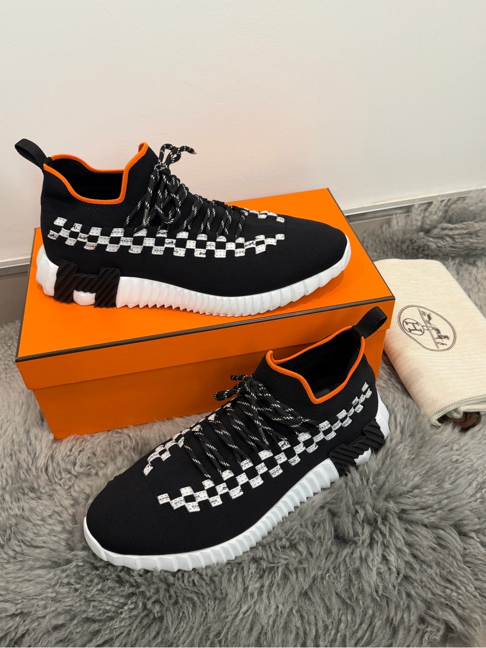 Hermès Flex Bolduc Knit Sneakers Black White Orange – Men’s EU 43 / US 10